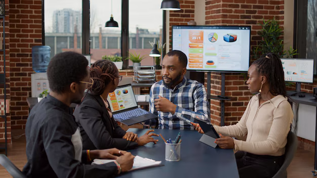 team african american people meeting office plan business strategy looking financial charts laptop creative colleagues doing collaboration project presentation development 482257 44807